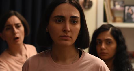 three women arguing