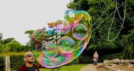 Image of Luke blowing bubbles