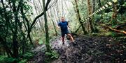 runner in mud