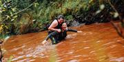 Runners in water