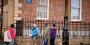 Group enjoying a walking tour with guide David from Derrie Danders