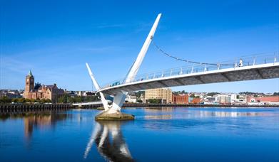 Peace Bridge Derry with Guildhall in background