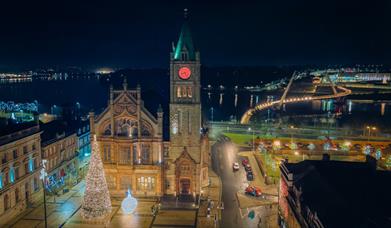 Aerial shot over Guildhall Square with Christmas Tree and Bauble