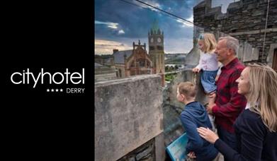 A family looking out at the Guildhall, with the City Hotel logo.