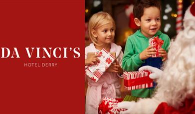 Children meeting Santa with the Da Vinci's logo.