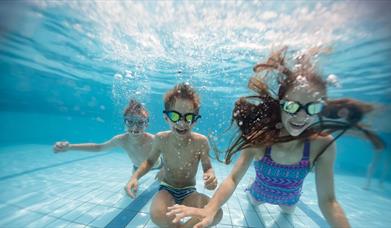 Family in pool at Roe Valley