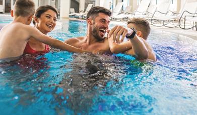 Family in pool at Roe Valley