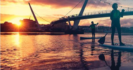 Paddleboarders at the Peace Bridge