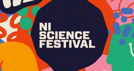 colourful image with black circle with writing saying "NI Science Festival"