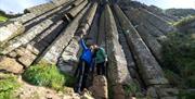couple take a selfie at the organ at the giant's causeway