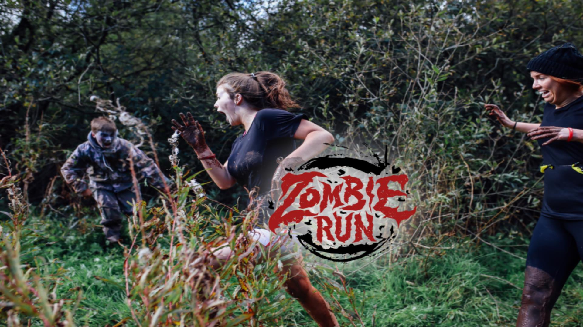 This is promotional poster for the 'Zombie Run' event organised by the Jungle NI. The poster displays participating runners being chased by a person d