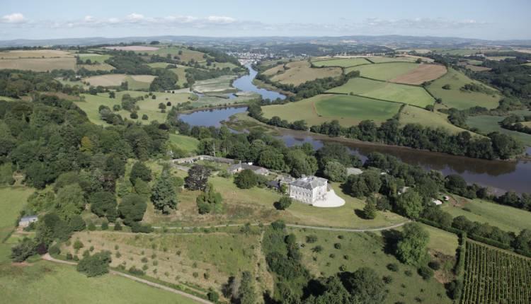 Sharpham House with The River Dart and Totnes in the background