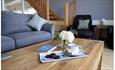 coffee table wooden floers book and tea