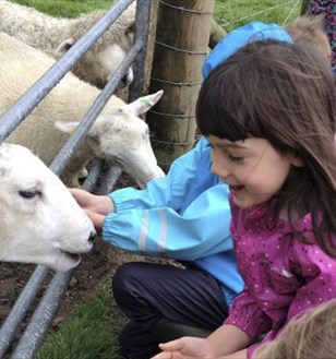 girl with lambs