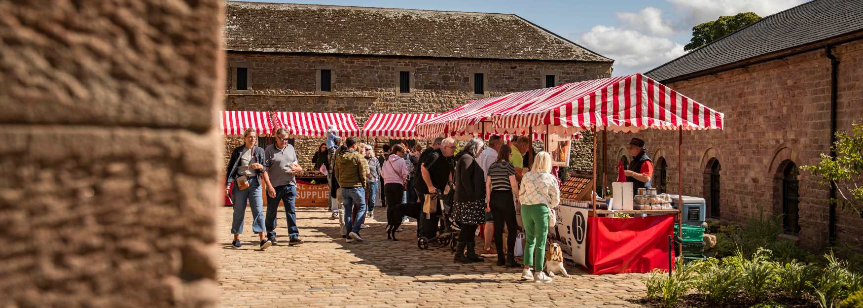 People looking at a market stall