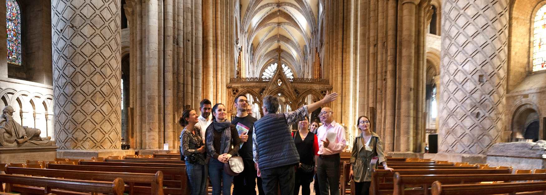 A group of people inside Durham Cathedral