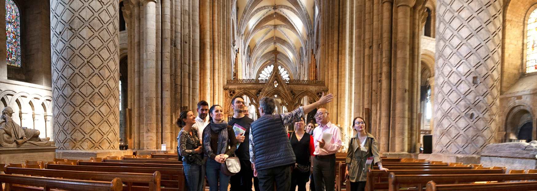 People standing inside Durham Cathedral