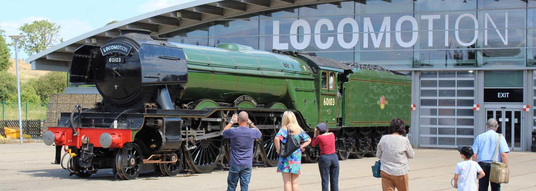 People looking at a train at Locomotion