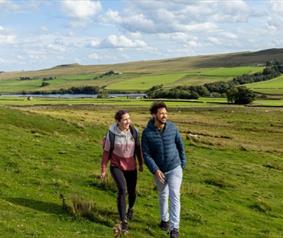 Two people walking in the Durham Dales