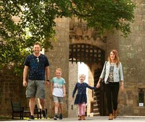 A family walking around at Raby Castle