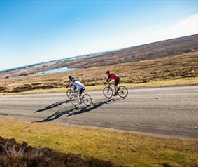men taking on a challenging bike ride in the durham dales 