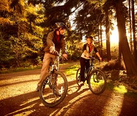 couple enjoying a bike ride in Hamsterley Forest