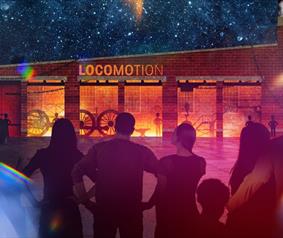 People at Locomotion looking at a Lumiere installation
