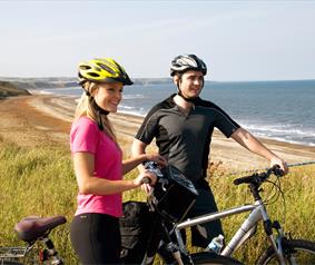 Two people on bikes