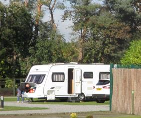 A man working on his caravan