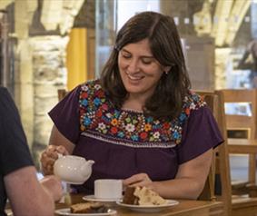 Two people sat eating at the Undercroft