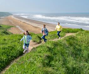 People walking on the beach banks in Durham
