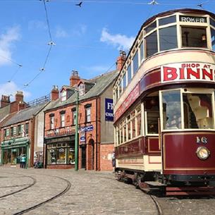 1900s Town, Street at Beamish Museum with Tram running through it.