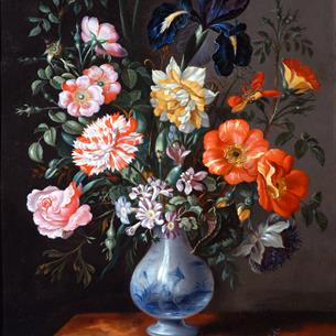 A still life painting of a floral arrangement in a blue and white porcelain vase placed on a wooden surface. The composition features various flowers 