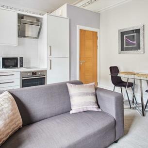 Lounge, dining and kitchenette at Mayford Studio