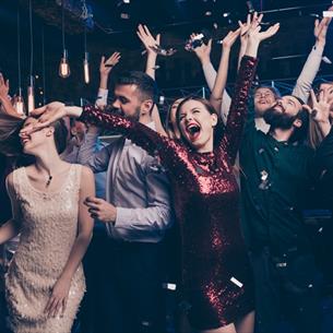 A group of people enjoying an Ultimate Party night at the Radisson Blu