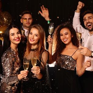 Group of people enjoying New Year's Eve at the Radisson Blu