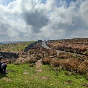 Countryside around Blanchland with women using App.
