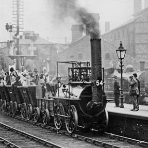People boarding a team train