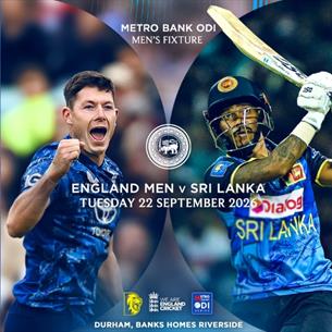 Two men playing cricket