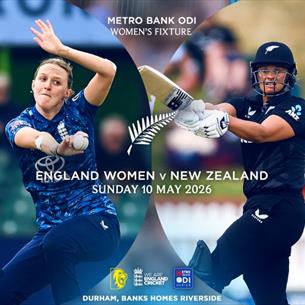 Two women playing cricket