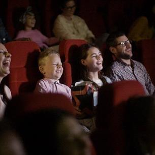 Family watching a movie at Cineworld.