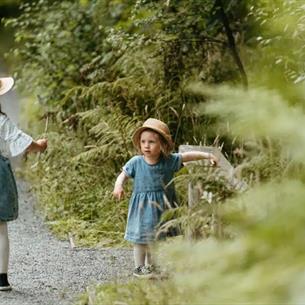 Two children walking the trail