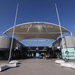 Dalton Park Outlet & Outdoors Main Visitor Entrance on a sunny day. 