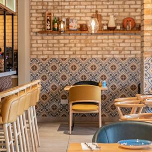 El-Castillo Tapas Restaurant in Bishop Auckland, mosaic tiled walls, seating and tables
