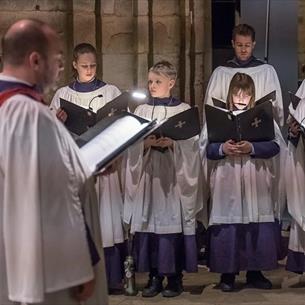 Members of the Durham Cathedral Choir performing.