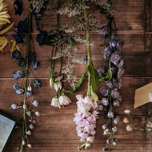 Spring Floral, a variety of flowers laid out on a wooden worktop