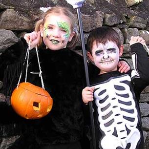 Two children dressed in Halloween costumes at Hall Hill Farm