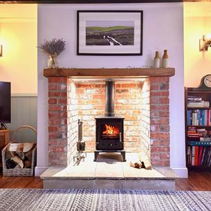 Log burner and brick fireplace