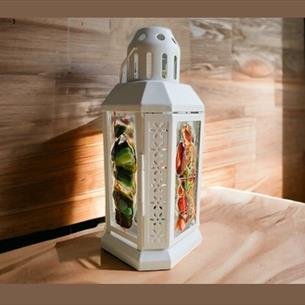 A fused glass autumn lantern