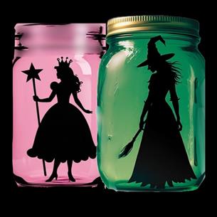 A pink and green lantern containing the silhouettes of Wicked characters